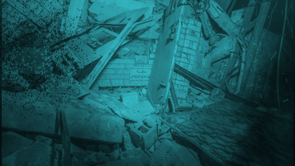 A blue-tinted image of ruins and destruction; there are pieces of the building everywhere.