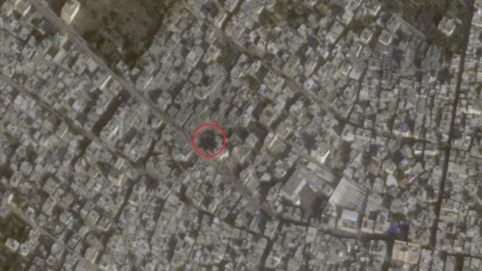 A satellite image of a crater where al-Maghazi al-Jadeed Bakery once stood.